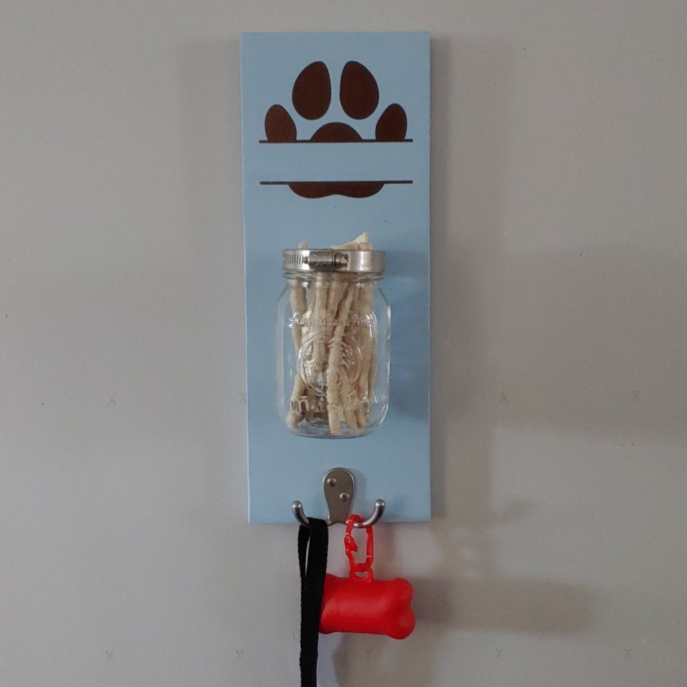 Wall mounted dog treat and leash holder